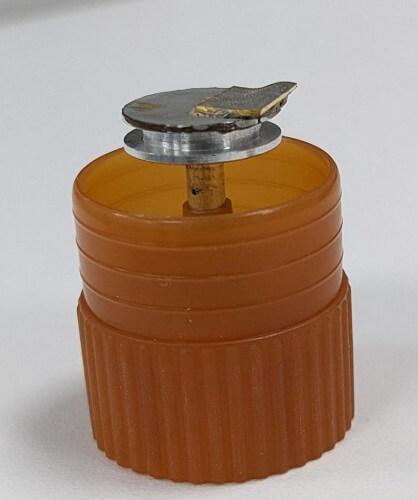 Photograph of a sample with 2 polished faces, with one face being EBSD ready and the other being flat