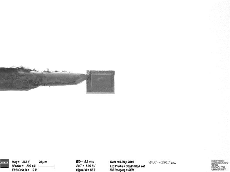 Figure 2. Electron micrograph showing the removed volume on the end of the needle