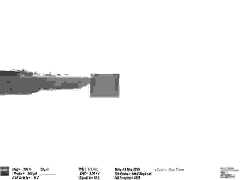 Figure 2. Electron micrograph showing the removed volume on the end of the needle