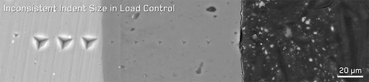 BSE micrograph of a line of 20 mN indentations across the HA coating illustrating the trade-off in spacing and depth in mapping performed under load control.