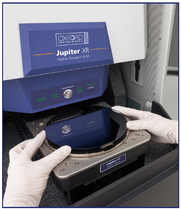 The Asylum Research Jupiter XR AFM holds samples as large as 210 mm, such as this 8-in wafer.